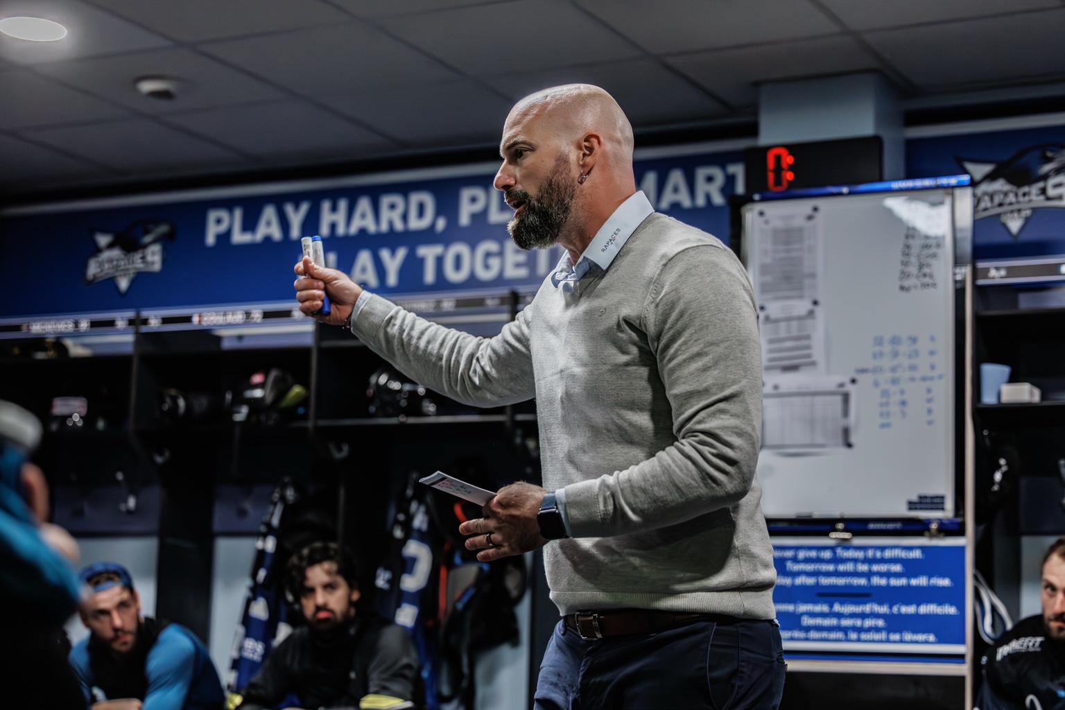 Hockey coach at rink
